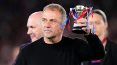 Hansi Flick Signs Contract Extension with Barcelona After Title Win