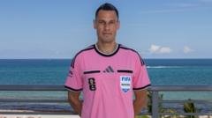 Referee's Unique Choice of Pink for Uruguay vs. Saudi Arabia